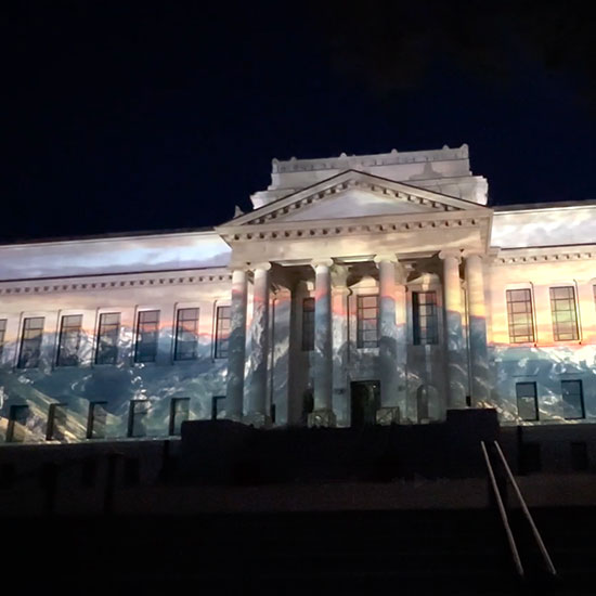 Projection mapping presentation on building on a college campus