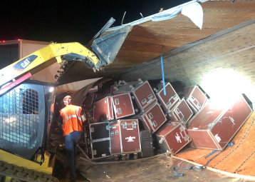 Damaged gear boxes spilling from the inside of a truck